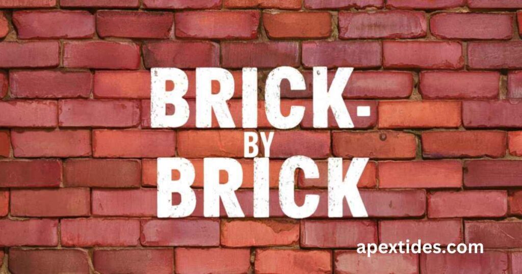  A textured brick wall featuring the phrase "brick by brick," embodying the theme of brick-by-brick-jokes-construction-puns-galore.