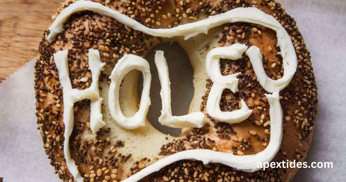 A bagel creatively forms the word "hole," showcasing a clever play on begal puns in a whimsical manner.