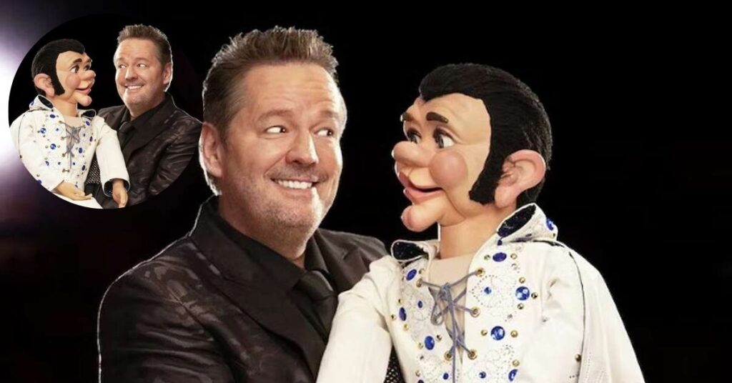 Close-up of Terry Fator holding Walter T. Airedale puppet, highlighting his signature ventriloquism skills and comedy act in 2025